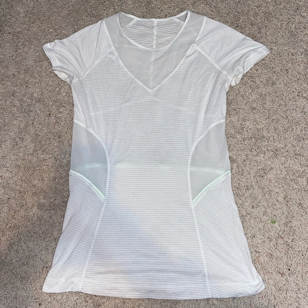 White Lulu Lemon top with mesh cut outs!